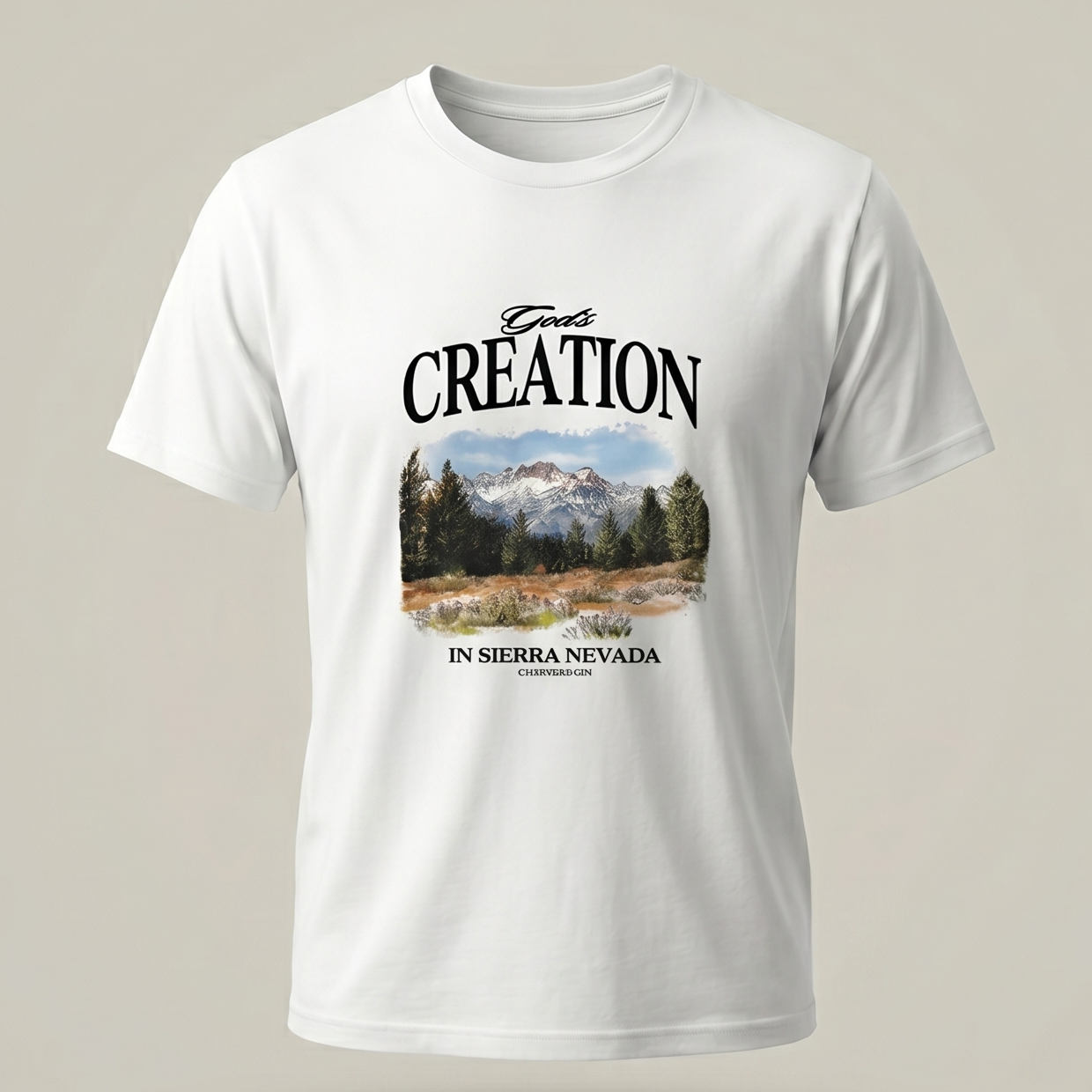 Vista frontal de camiseta blanca con diseño gráfico de montaña y pinos con el texto God's Creation In Sierra Nevada, y logo de Trnd.Ink en la parte superior de la espalda